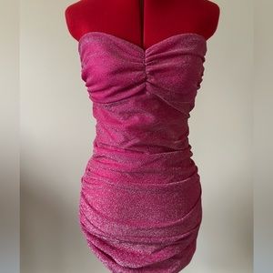 Party Season! Sparkly pink strapless dress with black detail.